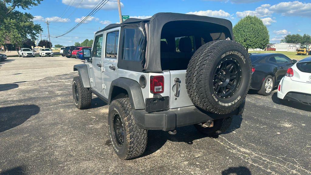 used 2011 Jeep Wrangler Unlimited car, priced at $12,995