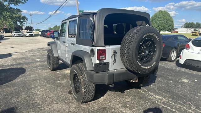 used 2011 Jeep Wrangler Unlimited car, priced at $12,495