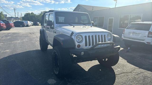 used 2011 Jeep Wrangler Unlimited car, priced at $12,495