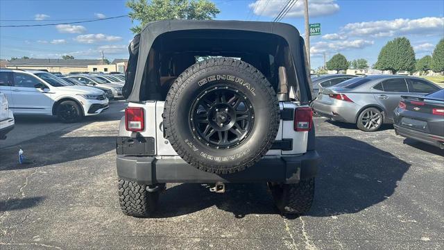 used 2011 Jeep Wrangler Unlimited car, priced at $12,495