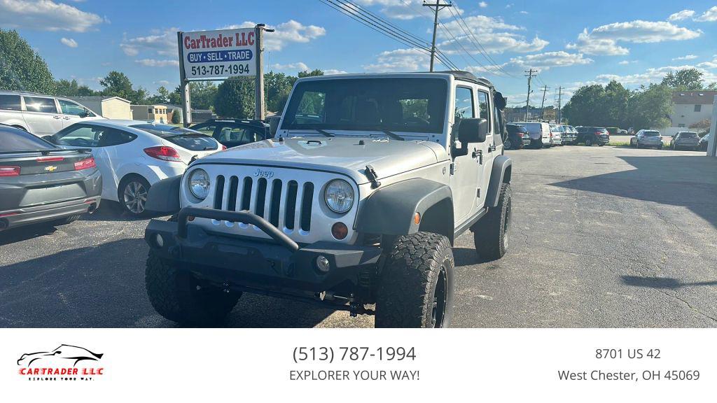 used 2011 Jeep Wrangler Unlimited car, priced at $12,995