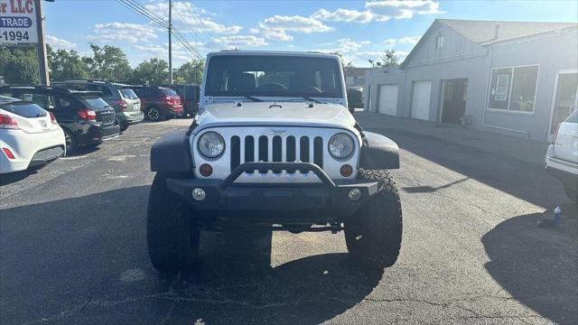 used 2011 Jeep Wrangler Unlimited car, priced at $12,495