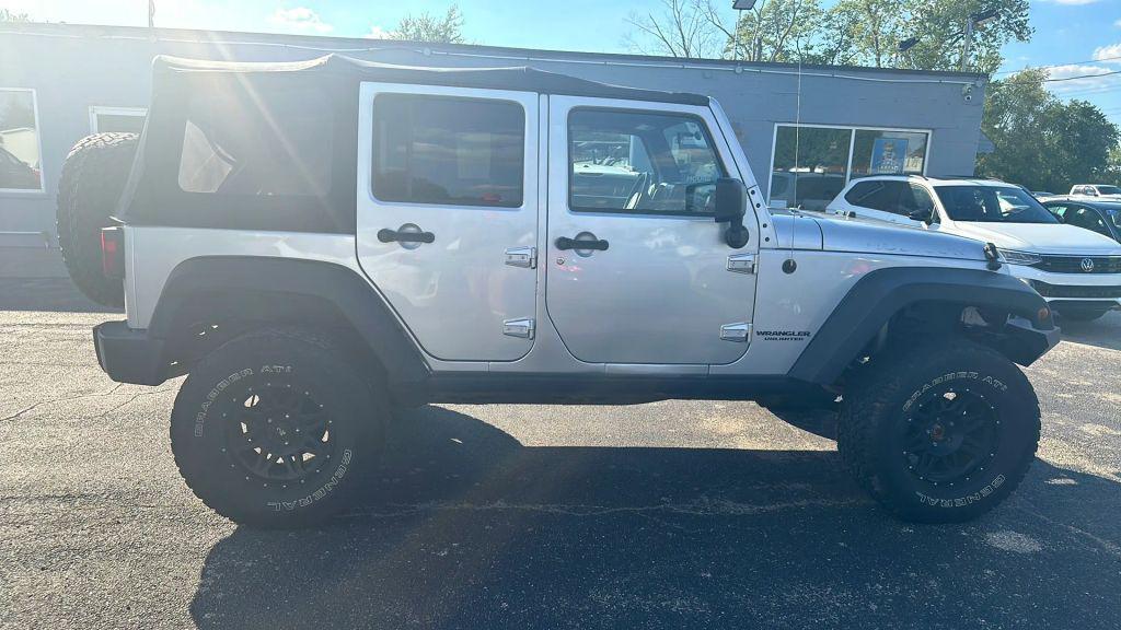 used 2011 Jeep Wrangler Unlimited car, priced at $12,995