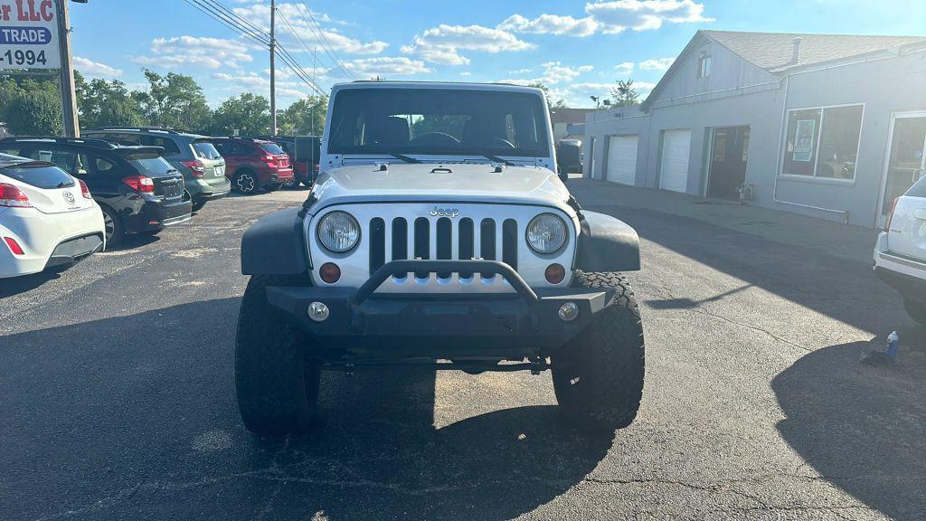 used 2011 Jeep Wrangler Unlimited car, priced at $12,995