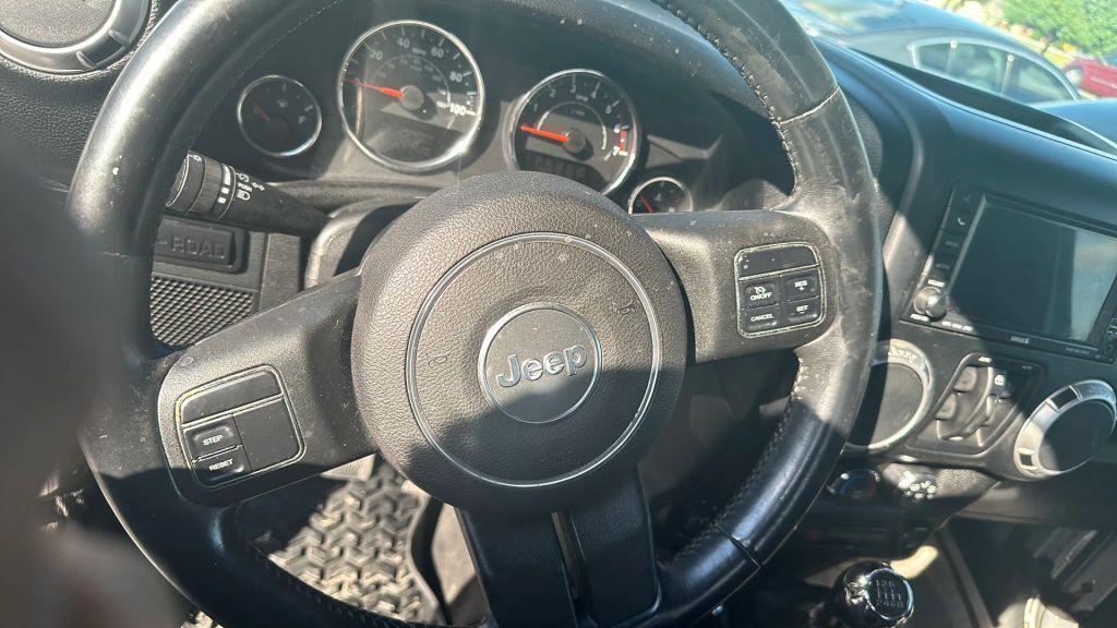 used 2011 Jeep Wrangler Unlimited car, priced at $12,995