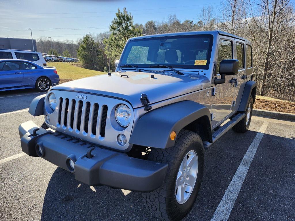 used 2014 Jeep Wrangler Unlimited car, priced at $15,499