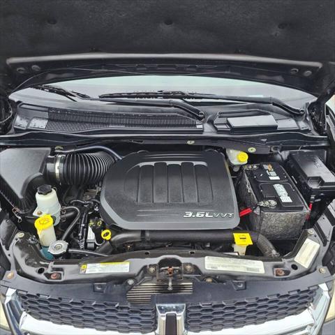 used 2012 Dodge Grand Caravan car, priced at $8,490