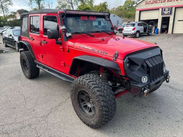 used 2014 Jeep Wrangler Unlimited car, priced at $15,495