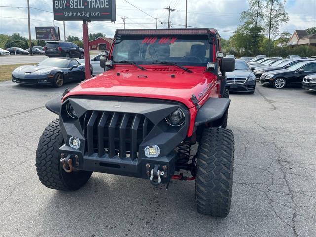 used 2014 Jeep Wrangler Unlimited car, priced at $15,495