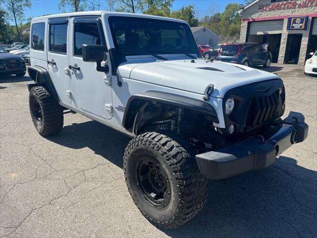 used 2018 Jeep Wrangler JK Unlimited car, priced at $23,995