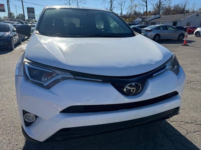 used 2018 Toyota RAV4 car, priced at $13,995