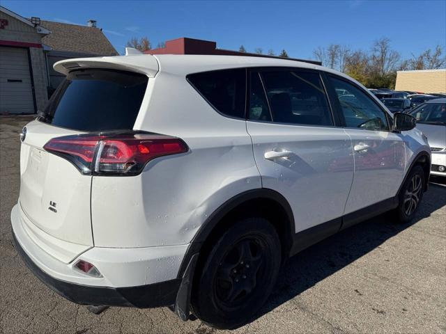 used 2018 Toyota RAV4 car, priced at $13,995