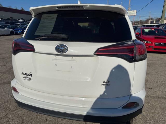 used 2018 Toyota RAV4 car, priced at $13,995