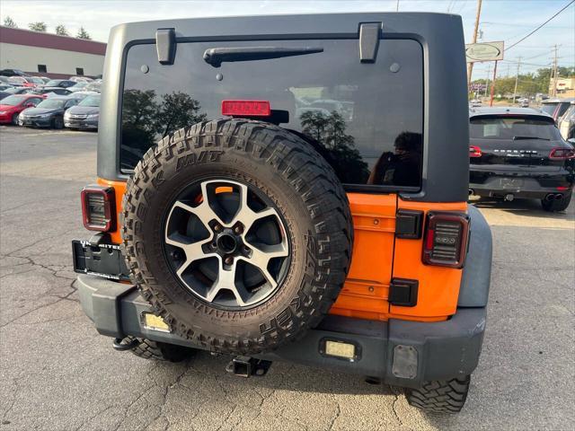 used 2013 Jeep Wrangler Unlimited car, priced at $15,995