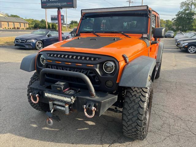 used 2013 Jeep Wrangler Unlimited car, priced at $12,995