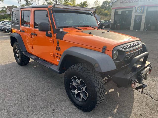 used 2013 Jeep Wrangler Unlimited car, priced at $12,995