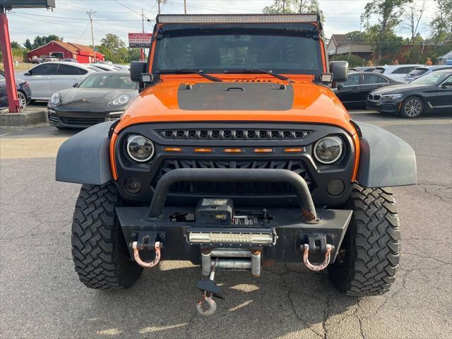 used 2013 Jeep Wrangler Unlimited car, priced at $15,995