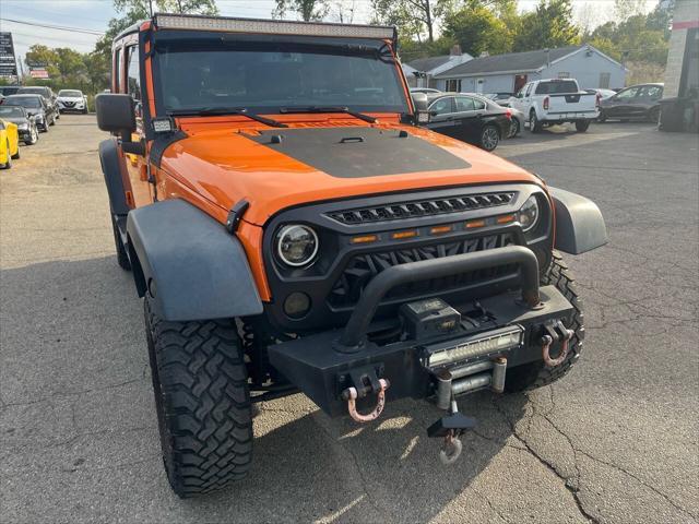 used 2013 Jeep Wrangler Unlimited car, priced at $12,995