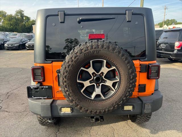 used 2013 Jeep Wrangler Unlimited car, priced at $12,995