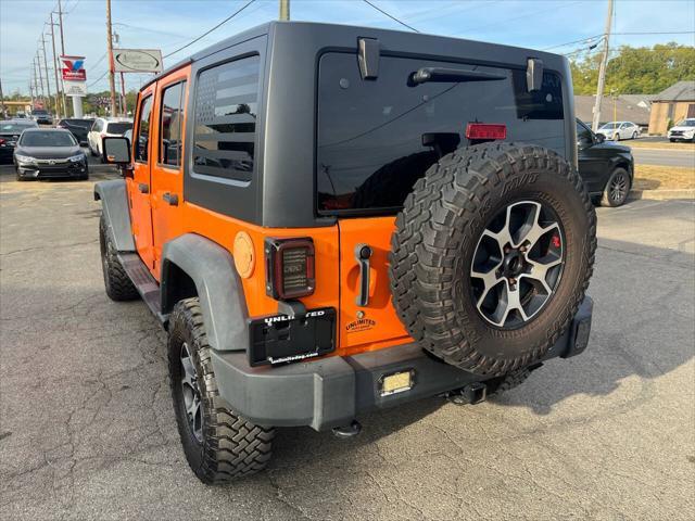 used 2013 Jeep Wrangler Unlimited car, priced at $12,995