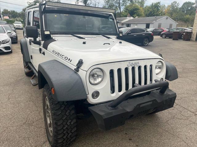 used 2015 Jeep Wrangler Unlimited car, priced at $18,995