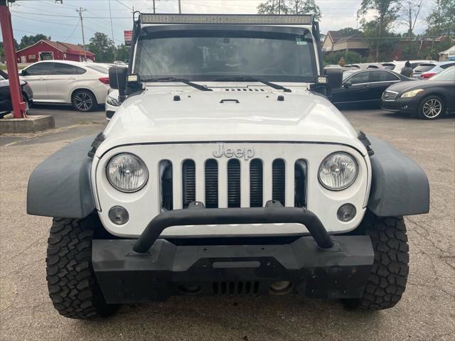 used 2015 Jeep Wrangler Unlimited car, priced at $12,495