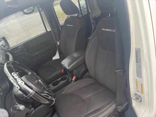 used 2015 Jeep Wrangler Unlimited car, priced at $12,495