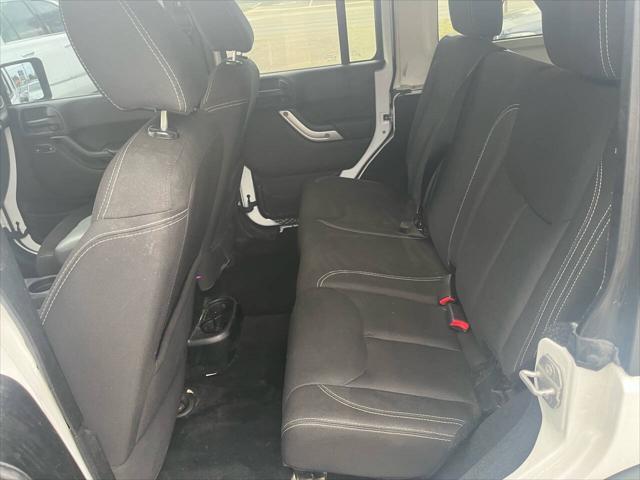 used 2015 Jeep Wrangler Unlimited car, priced at $12,495