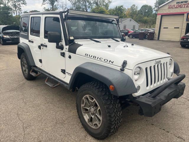 used 2015 Jeep Wrangler Unlimited car, priced at $12,495