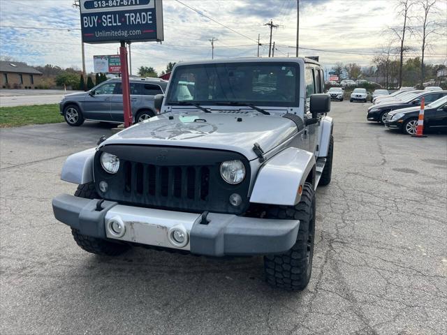 used 2014 Jeep Wrangler Unlimited car, priced at $16,995