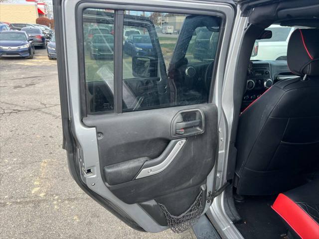 used 2014 Jeep Wrangler Unlimited car, priced at $16,995