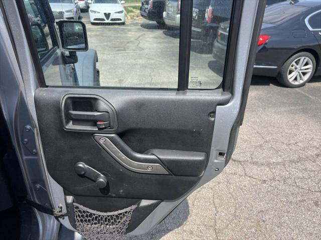 used 2013 Jeep Wrangler Unlimited car, priced at $12,495