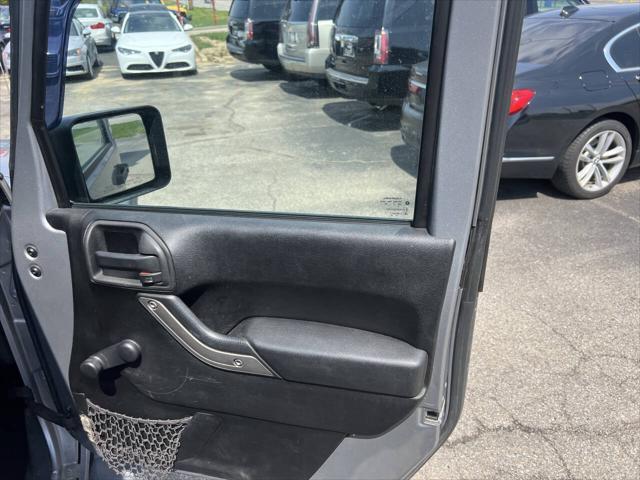 used 2013 Jeep Wrangler Unlimited car, priced at $12,495