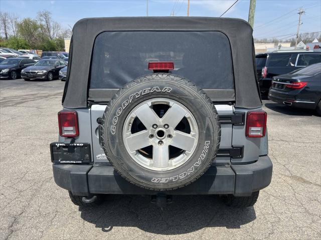 used 2013 Jeep Wrangler Unlimited car, priced at $12,495