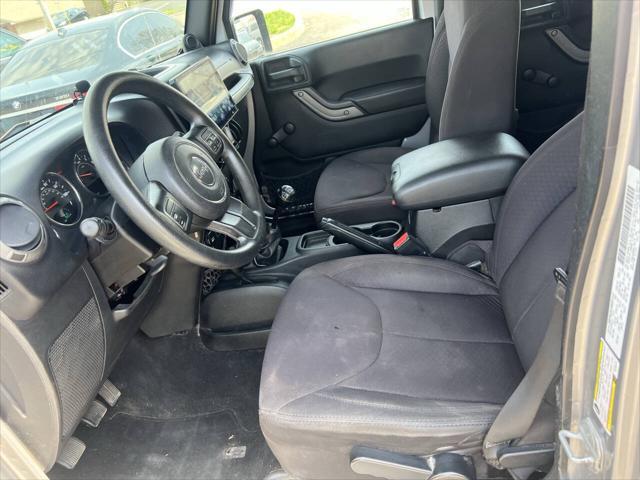 used 2013 Jeep Wrangler Unlimited car, priced at $12,495