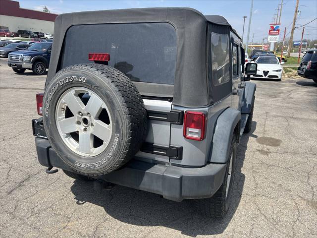 used 2013 Jeep Wrangler Unlimited car, priced at $12,495