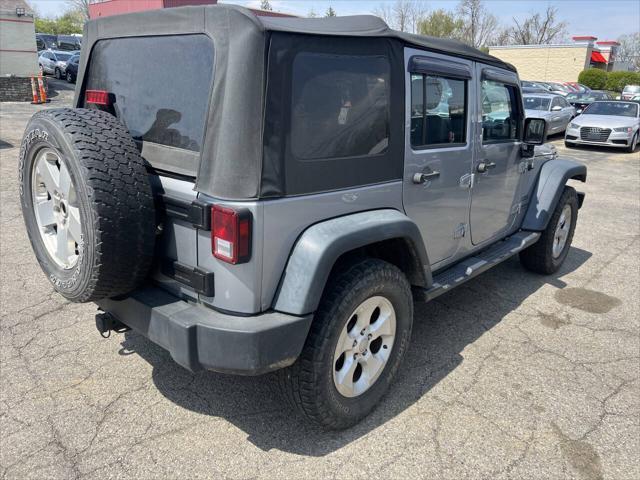 used 2013 Jeep Wrangler Unlimited car, priced at $12,495