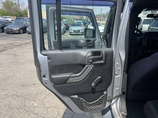 used 2013 Jeep Wrangler Unlimited car, priced at $12,495