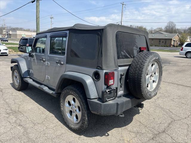 used 2013 Jeep Wrangler Unlimited car, priced at $12,495