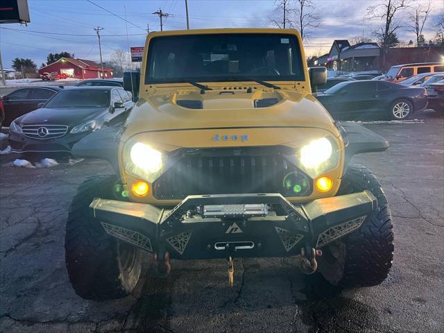 used 2015 Jeep Wrangler Unlimited car, priced at $17,995