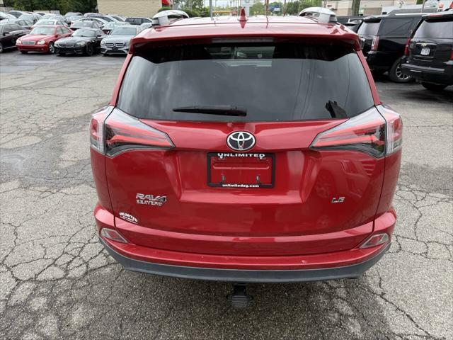 used 2016 Toyota RAV4 car, priced at $13,495