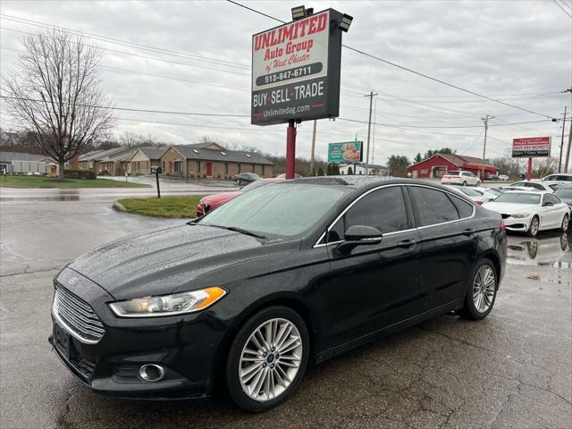 used 2014 Ford Fusion car, priced at $6,995