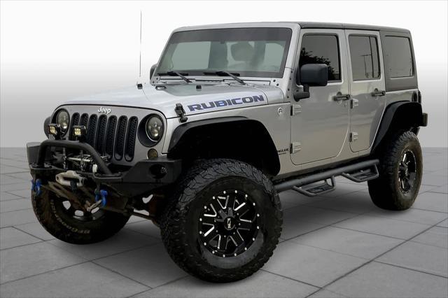used 2015 Jeep Wrangler Unlimited car, priced at $19,490