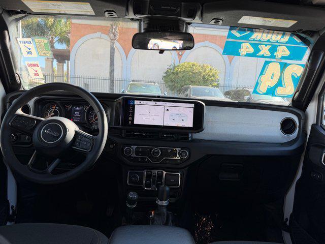 used 2024 Jeep Wrangler car, priced at $33,805