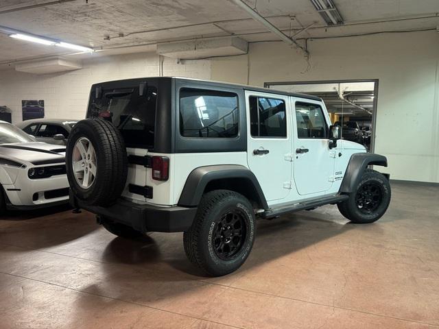 used 2014 Jeep Wrangler Unlimited car, priced at $22,995