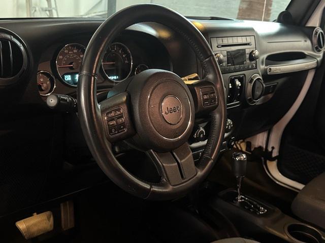 used 2014 Jeep Wrangler Unlimited car, priced at $22,995