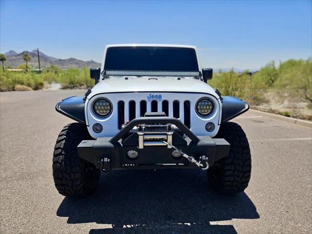 used 2014 Jeep Wrangler Unlimited car, priced at $13,995