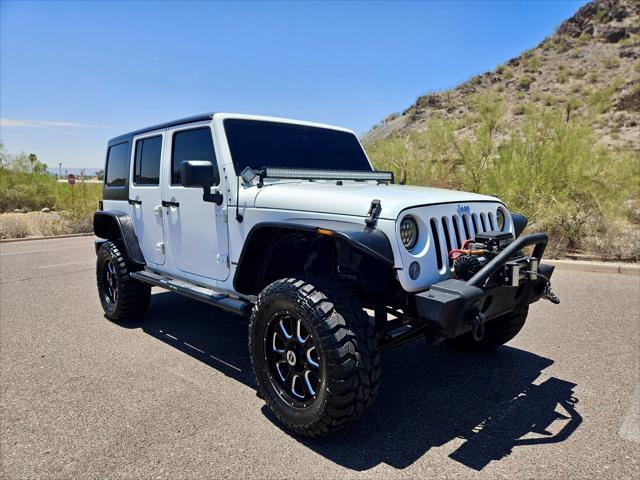 used 2014 Jeep Wrangler Unlimited car, priced at $13,995