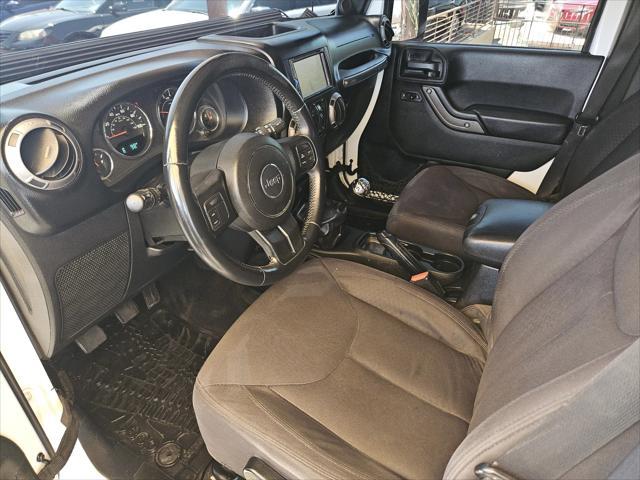 used 2014 Jeep Wrangler Unlimited car, priced at $13,995