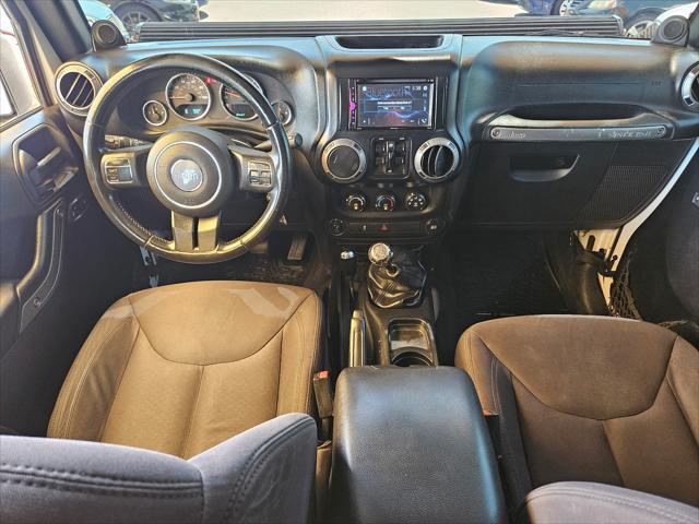 used 2014 Jeep Wrangler Unlimited car, priced at $13,995